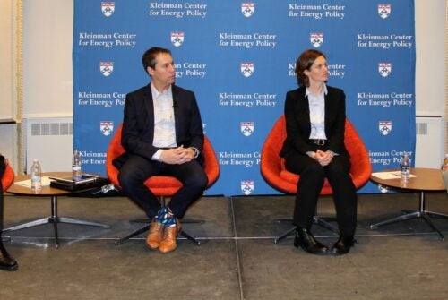 A group of panelists in front of the Kleinman stage