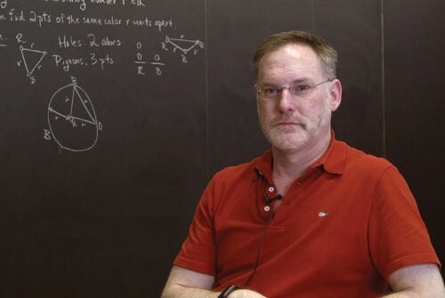 Rob Carpick in front of a chalkboard