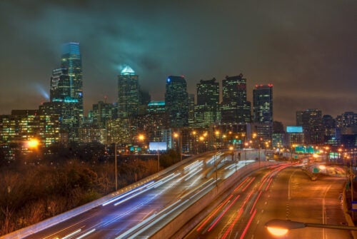 City skyline with moving traffic