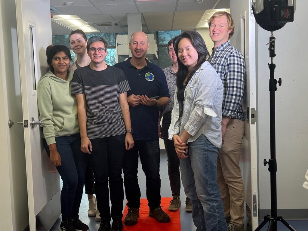 Clean Energy Conversion lab members in front of lab door