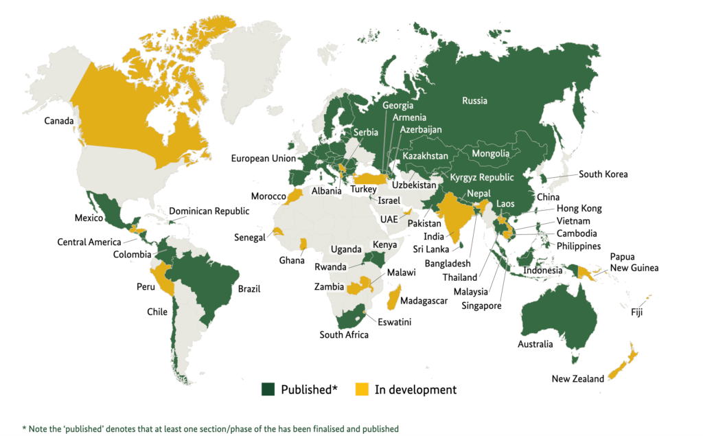 A world map showing which countries have implemented or are developing sustainable finance taxonomies, based on the Taxonomy Roadmap Initiative Progress Report (Nov 2025).